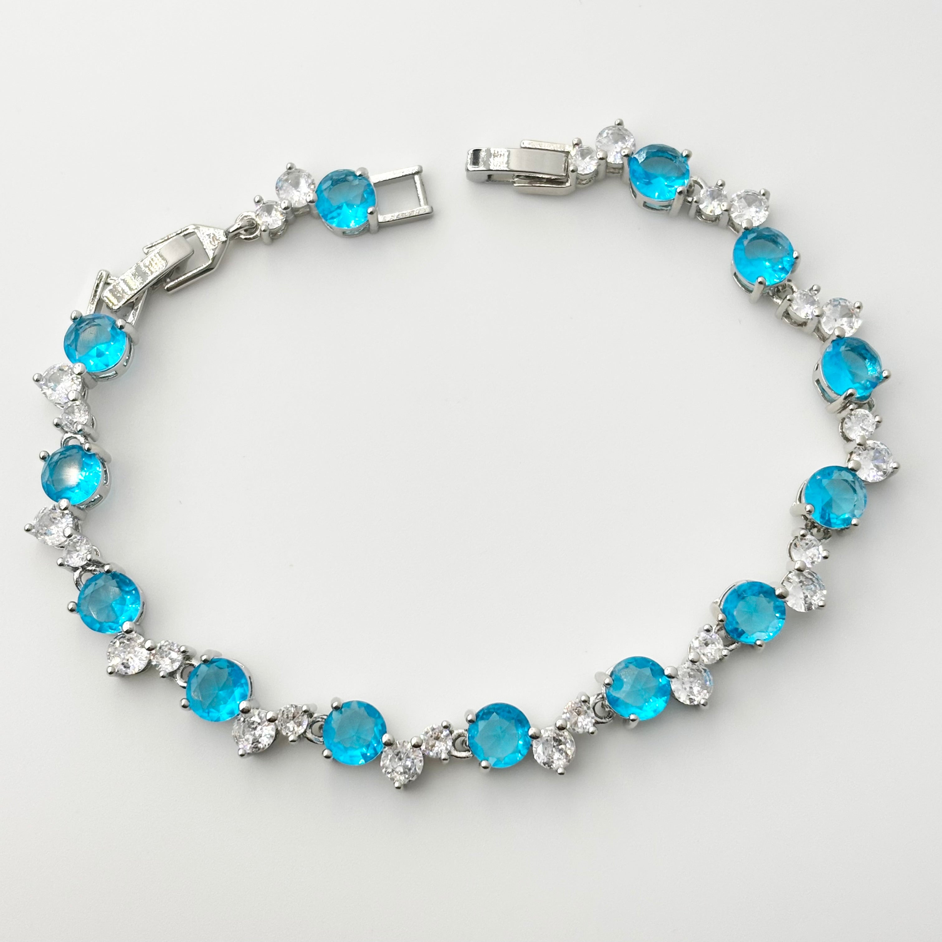 Blue Round Stone Cluster Tennis Bracelet with Clear Cubic Zirconia