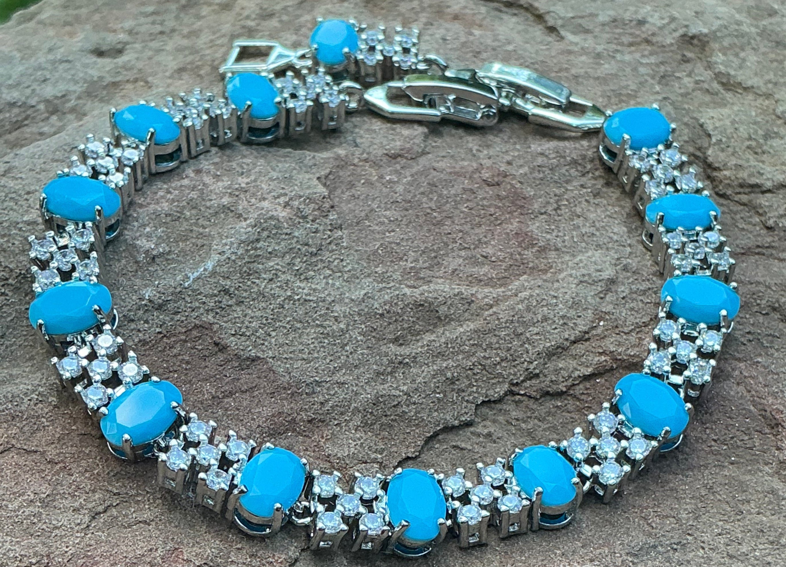 Turquoise Blue Oval Cut Link Tennis Bracelet with Cubic Zirconia