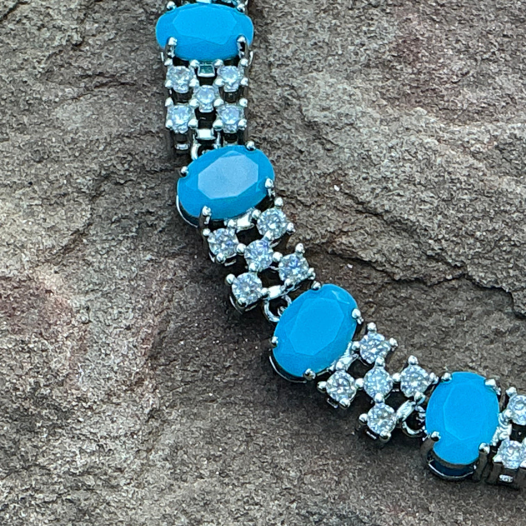 Turquoise Blue Oval Cut Link Tennis Bracelet with Cubic Zirconia