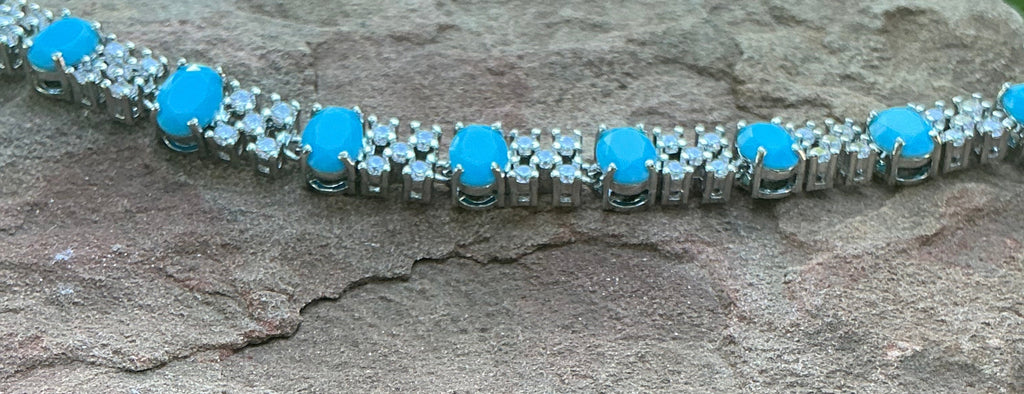 Turquoise Blue Oval Cut Link Tennis Bracelet with Cubic Zirconia