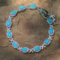 Turquoise Blue Oval Cut Link Tennis Bracelet with Cubic Zirconia