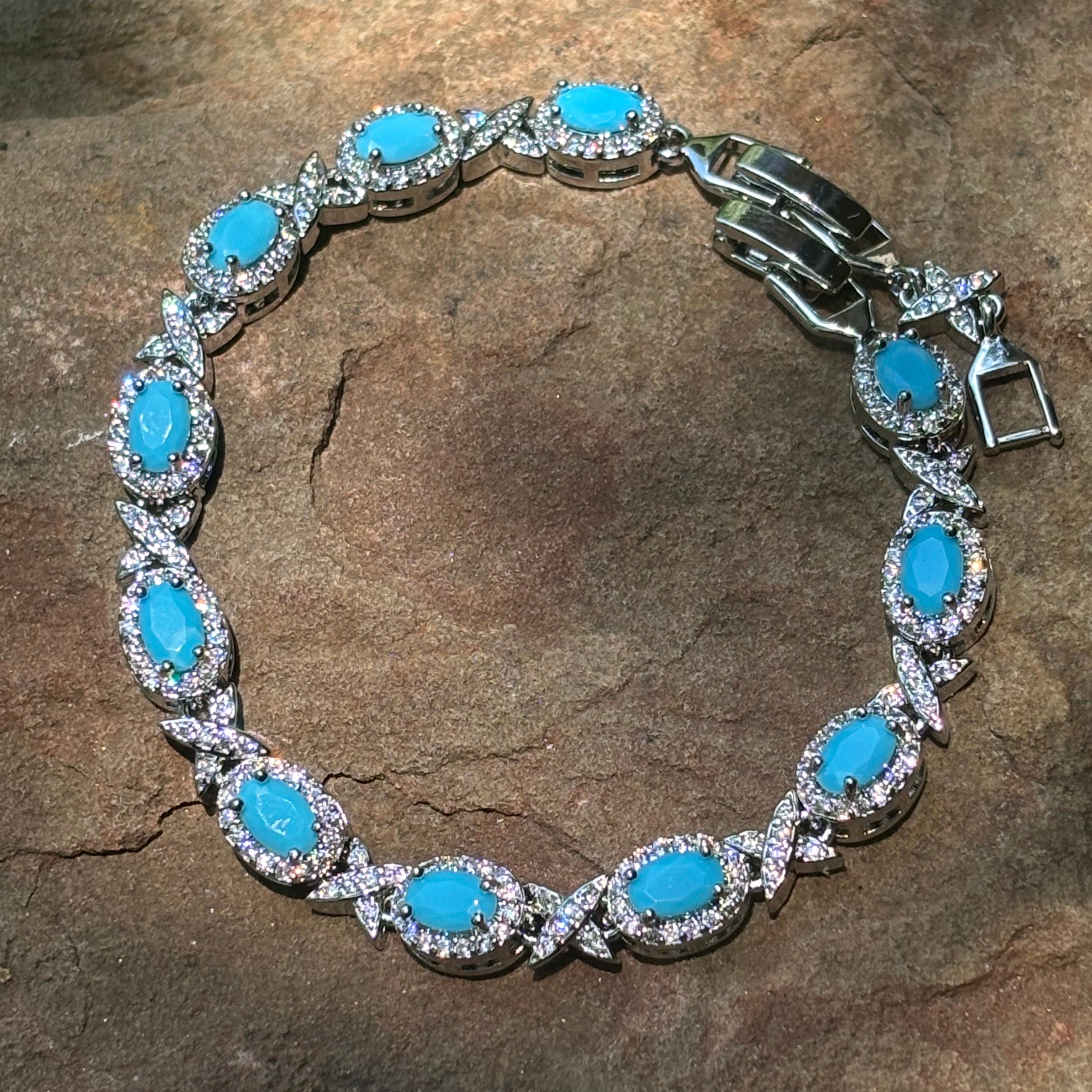 Turquoise Blue Oval Cut Link Tennis Bracelet with Cubic Zirconia