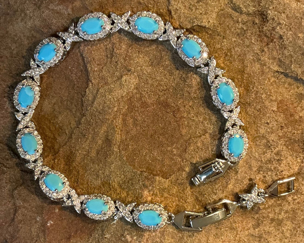 Turquoise Blue Oval Cut Link Tennis Bracelet with Cubic Zirconia