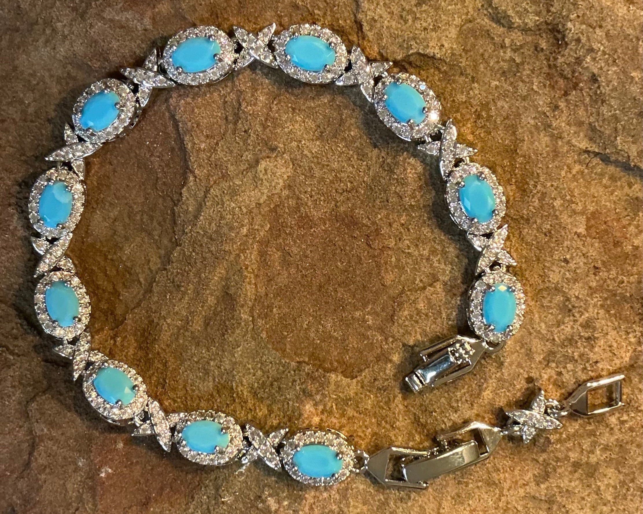 Turquoise Blue Oval Cut Link Tennis Bracelet with Cubic Zirconia